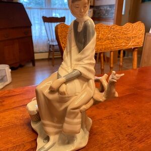 Elegant Porcelain Figurine in Cream and Gray